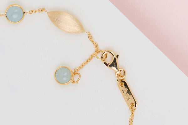18ct. Yellow Gold Bracelet - Blue Topaz - 19CM