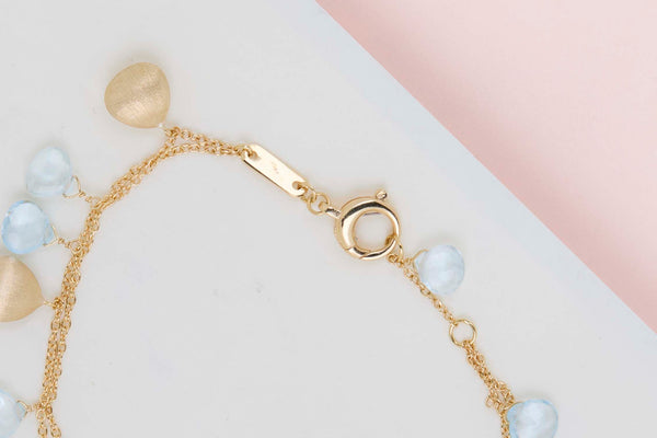 18ct. Yellow Gold Bracelet - Blue Topaz - 19CM