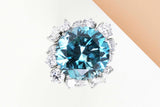 18ct. White Gold Ring - Size 54 - Light Blue Topaas - 10 Navette Cut Diamonds - 6 Round Cut Diamonds